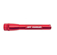 Red Mini Maglite Pro LED flashlight with Jeff Chandler engraving on the body
