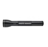 Black ML300L LED 3-Cell D flashlight with JOSEPH SCHMIDT engraving along the body