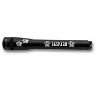 Black Mini Maglite Pro LED flashlight with paw print accents and GASPARD engraving