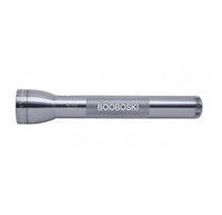 Gray ML300L LED 3-Cell D flashlight with a knurled grip and BOOBOSKI engraving