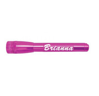 Pink Mini Maglite Pro LED flashlight with Brianna engraving on the body.