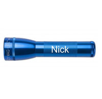 ML25LT blue two cell C flashlight with Nick engraved along the barrel.