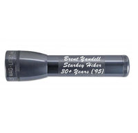 Gray ML25LT LED 2-Cell C flashlight with custom engraving shown in profile.