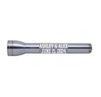 Gray ML300L 3-Cell D flashlight with the custom engraving Ashley & Alex June 15 2024.