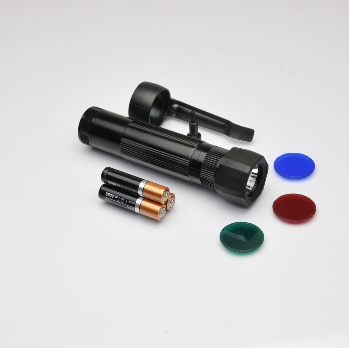 Partial view of the B2B XL50 LED Tactical Pack blister with a black flashlight and blue cap on white.