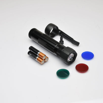 Close up of the B2B XL50 LED Tactical Pack flashlight with a mounting ring.