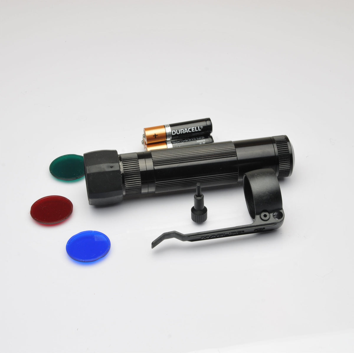 Duracell AA batteries on a Maglite XL50 LED tactical flashlight against a white background