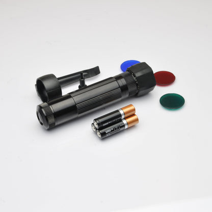 XL50 tactical pack components including batteries and color discs on a white surface