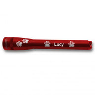 Red Mini Maglite Pro LED flashlight with paw print accents and the name Lucy engraved.