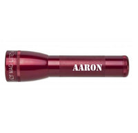 Red ML25LT LED 2-Cell C flashlight with engraved AARON along the body