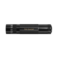 Black XL50 LED 3-Cell AAA flashlight with engraved Dick Guerrant