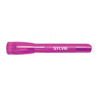 Pink Mini Maglite Pro LED flashlight with custom engraving on the barrel