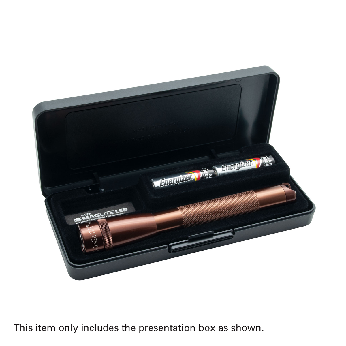 Copper Maglite Pro LED flashlight inside open presentation box with batteries visible.