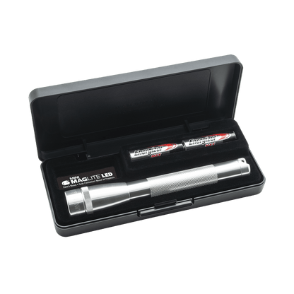 Mini Maglite LED 2AA flashlight with knurled grip and Energizer Max AA batteries nearby in a display case