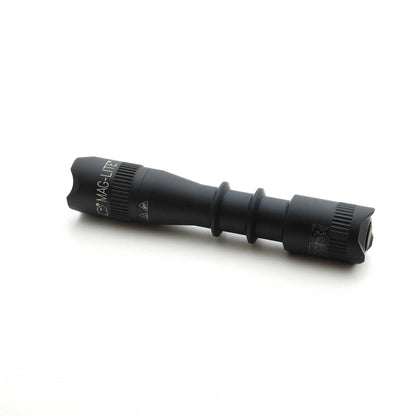 Black MAG-TAC 2 TM tactical flashlight with crown bezel and textured grip.
