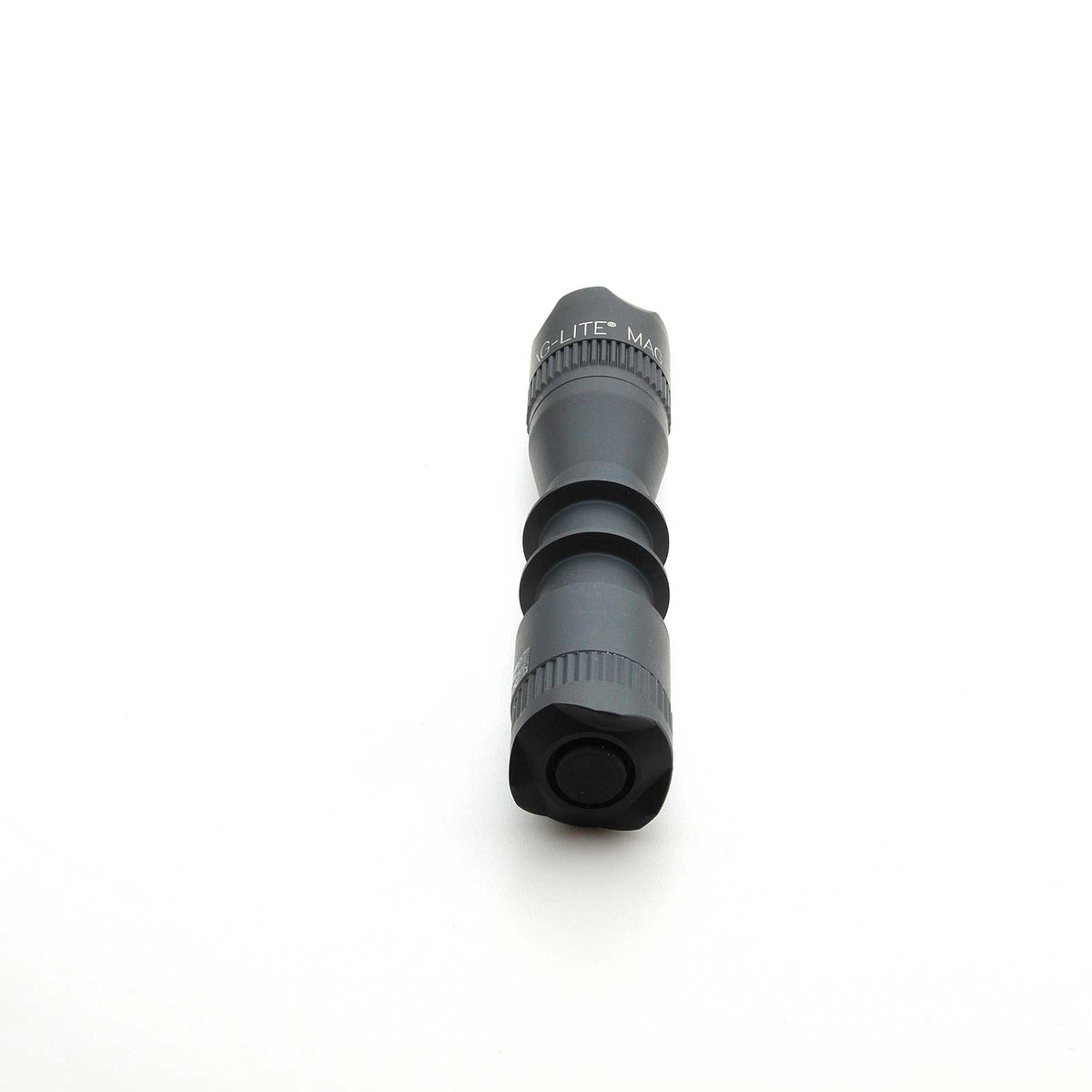 Crown bezel with MAG-LITE text on a MAG-TAC 2 TM flashlight component