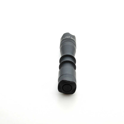 Crown bezel with MAG-LITE text on a MAG-TAC 2 TM flashlight component