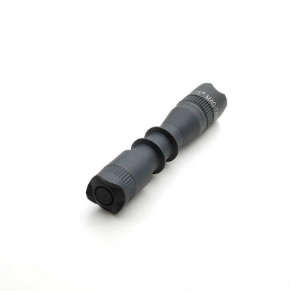 Angled view of MAG-TAC 2 TM Black Crown Bezel with textured grip and segmented tube