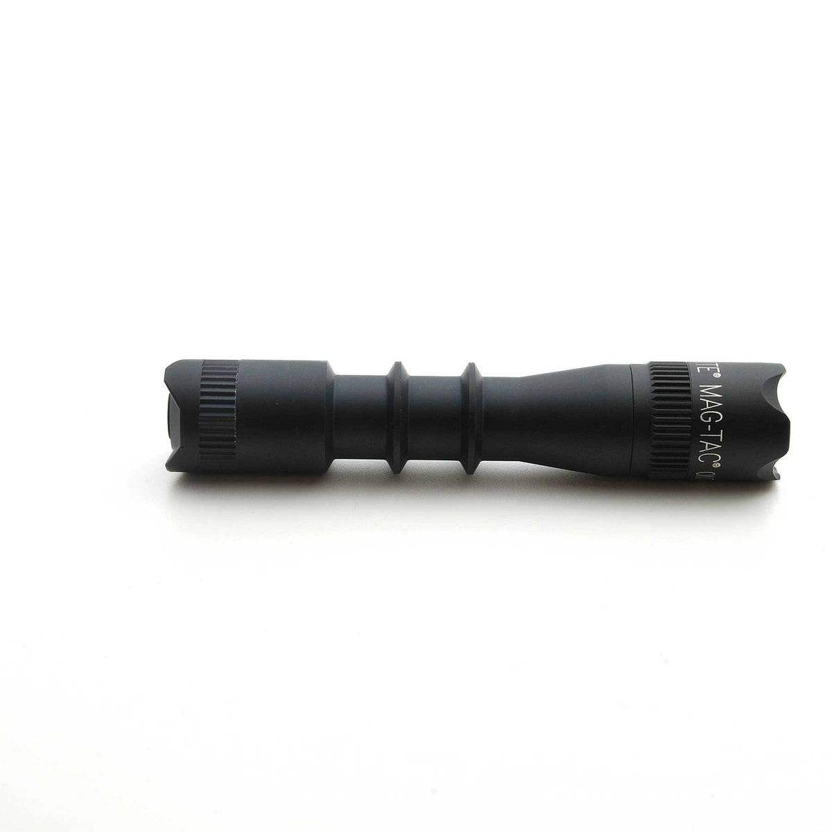 End view of MAG-TAC 2 TM Black Crown Bezel highlighting the cylindrical body and MAG-TAC text