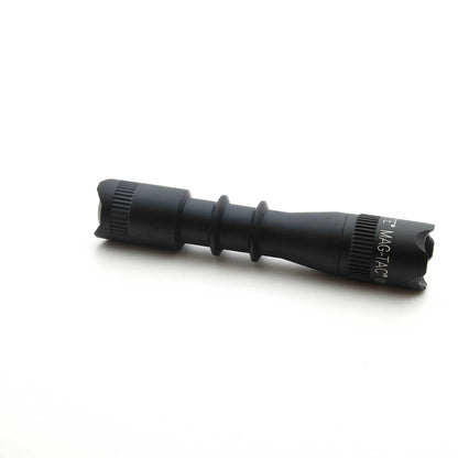 Close up of MAG-TAC 2 TM Black Crown Bezel flashlight showing matte black body and knurled grip
