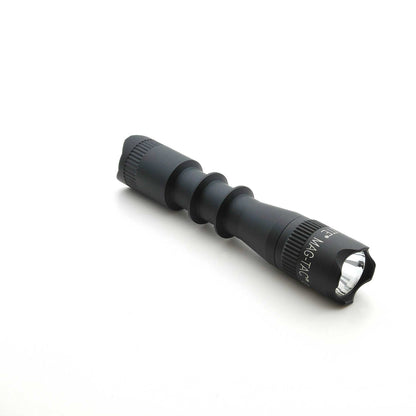 Forward-facing view of MAG-TAC 2 TM Black Crown Bezel with exposed lens and rugged finish