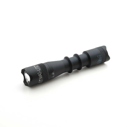 Black Mag-Tac 2TM tactical flashlight with crown bezel on white background