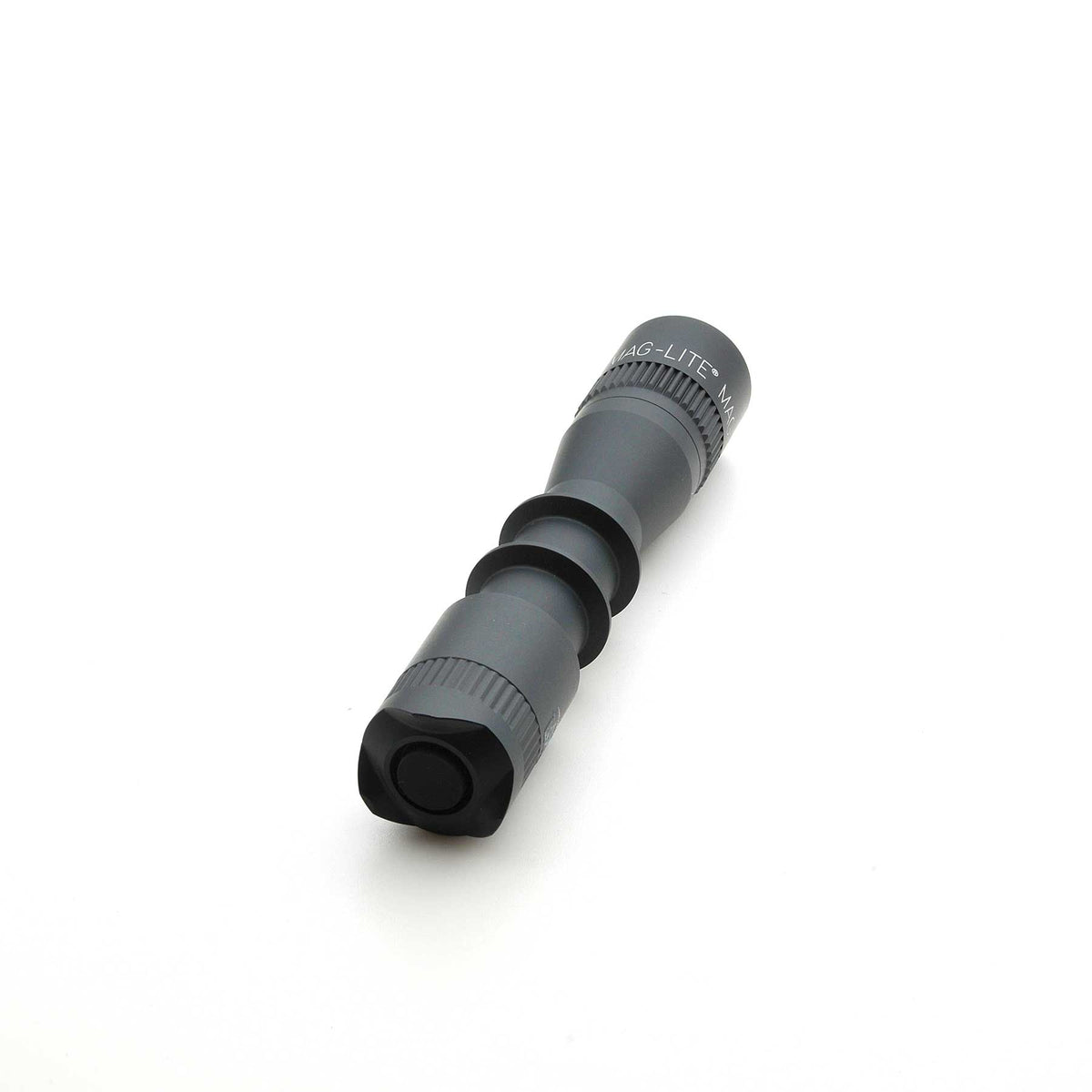 Side view of MAG-LITE MAG-TAC 2 TL Black Plain Bezel flashlight showing its textured midsection