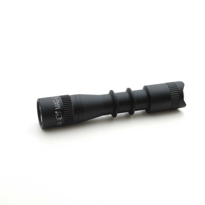 Diagonal bottom-right view of MAG-TAC 2 TL Black Plain Bezel flashlight highlighting the knurled grip and tail end
