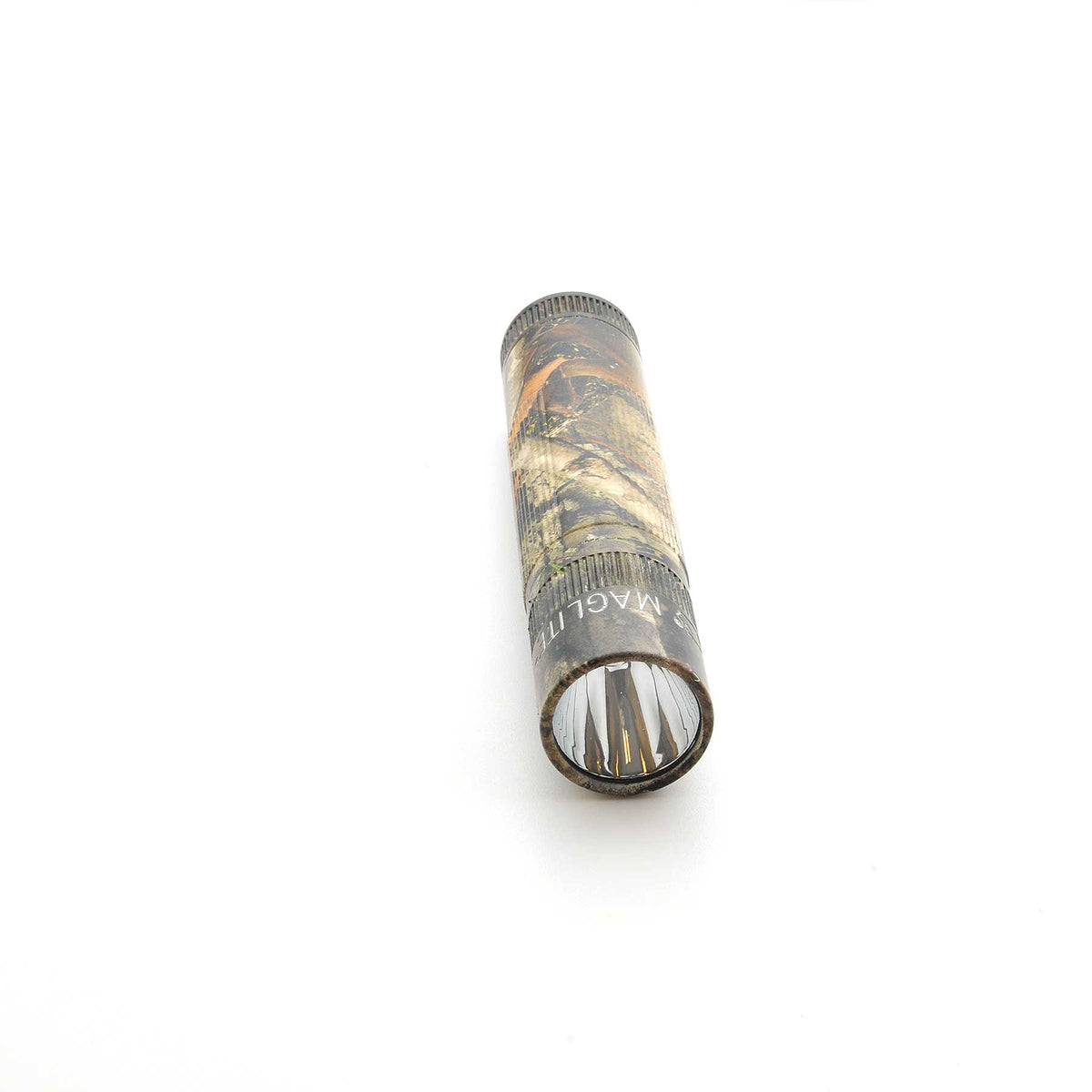 Maglite XL50 flashlight in Mossy Oak New Country DNA camouflage with lens visible at the bottom