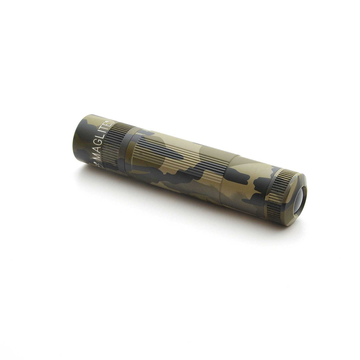 Maglite XL50 flashlight in Mossy Oak Original Bottomland camouflage photographed at a low angle.