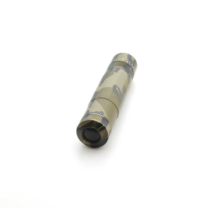 Maglite XL50 flashlight in Mossy Oak Original Bottomland camouflage shown from the end with lens cap visible.