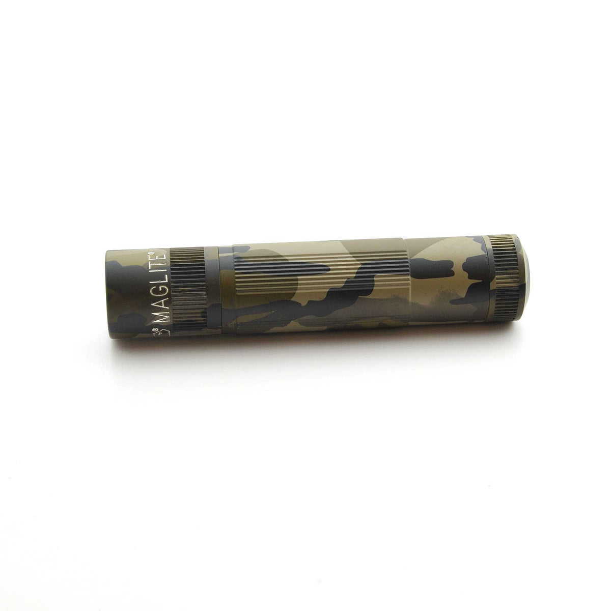 MAGLITE XL50 flashlight in Mossy Oak Original Bottomland camouflage lying horizontally on white background