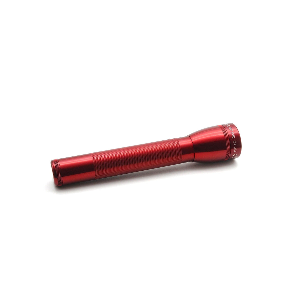 Red aluminum flashlight with knurled surface and head detail visible, angled on white background