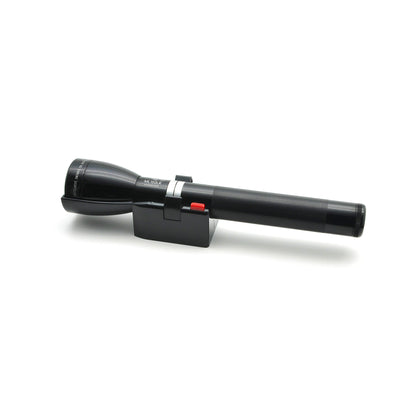 ML150LR Mag Charger flashlight with charging cradle and red switch on a white background.