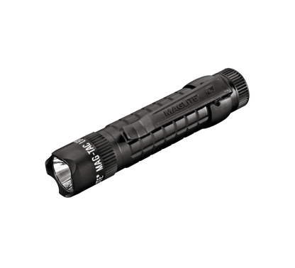 Close up of MAG-TAC CR123 LED flashlight head with the crowned bezel against a black background