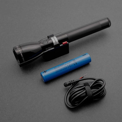 ML150LR Mag Charger flashlight angled to show textured grip and red activation switch.