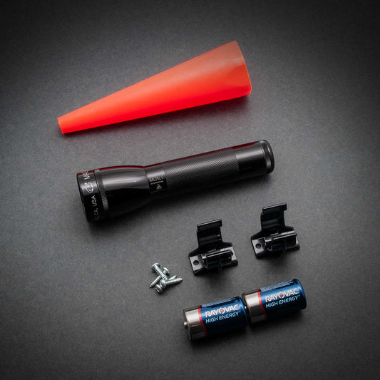 Maglite ML25L flashlight with red silicone sleeve and assorted parts including batteries