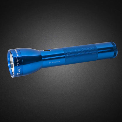 Blue ML300L LED 2-Cell D flashlight with knurled grip shown diagonally on a dark surface
