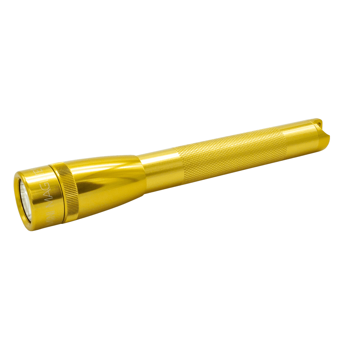 Gold Maglite Pro LED pocket flashlight partially visible against a green background