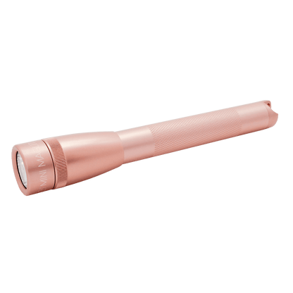 Soft pink Maglite Pro LED pocket flashlight with knurled grip close up