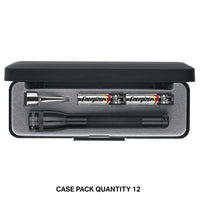 Open travel case showing a Mini Maglite 2AAA Classic flashlight and two AAA batteries in foam