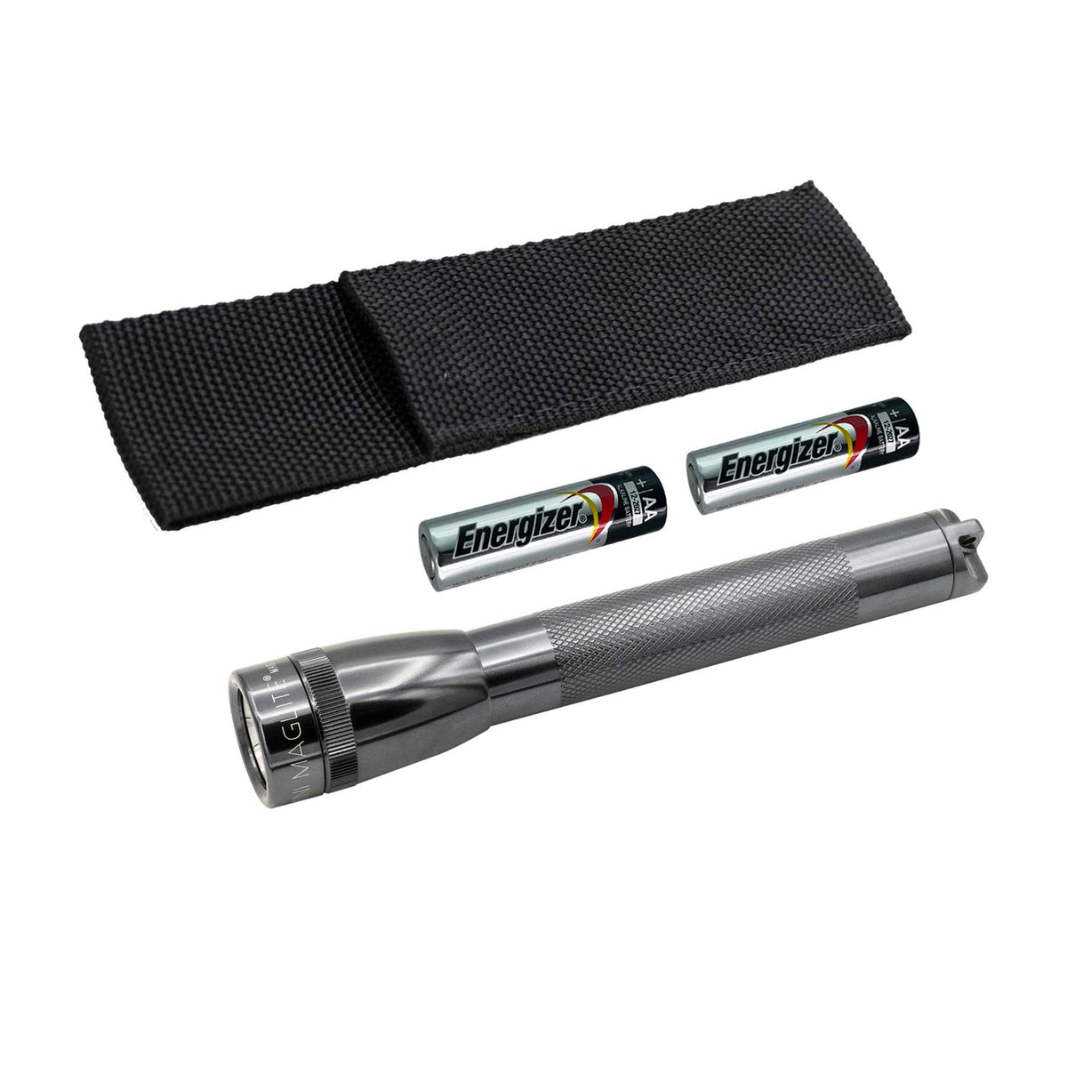 Maglite Xenon flashlight with textured grip beside EnerGizer AA batteries in view