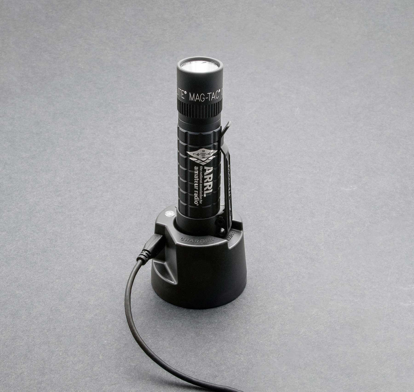 The MAG-TAC LED Rechargeable Flashlight with special engraving