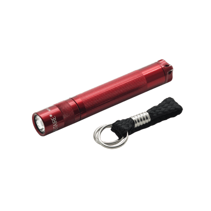 Red Solitaire LED keychain flashlight with knurled body and braided lanyard.
