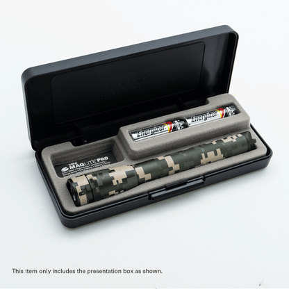 Camouflage Maglite Pro flashlight inside a presentation box with foam insert and Energizer batteries.