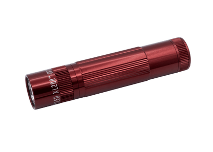 Diagonal view of a red Maglite XL200 LED flashlight with knurled body