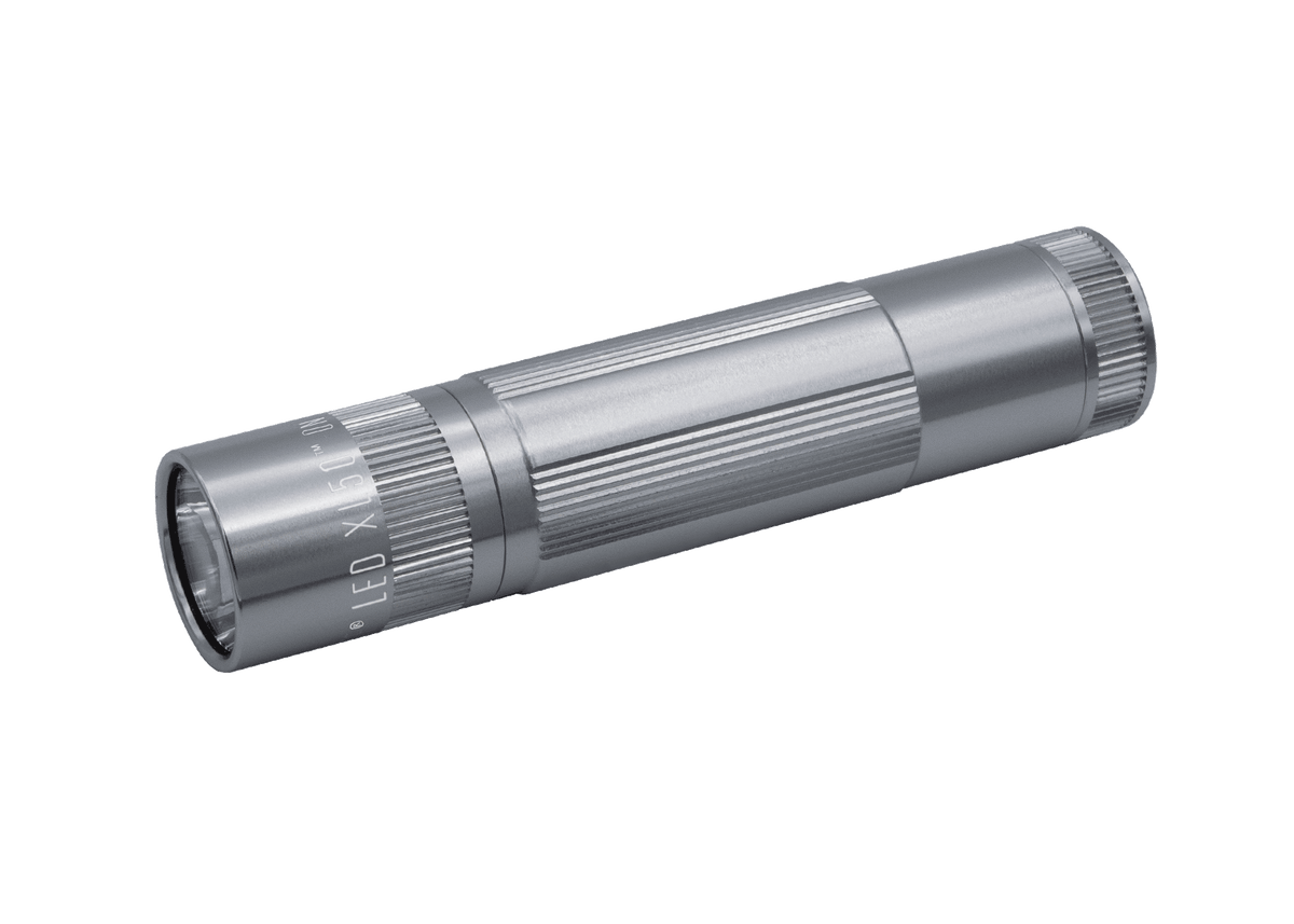 Maglite XL50 LED 3-Cell AAA flashlight resting on its presentation box with branding