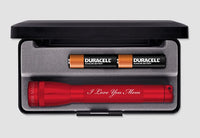 Red Mini Maglite flashlight with I Love You Mom text in white on the body in a foam case with two Duracell batteries