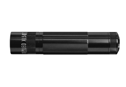 Black XL50 LED tactical flashlight barrel on a green background